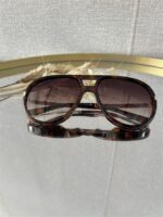 Zonnebril Golden Muse