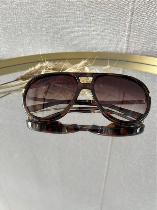 Zonnebril Golden Muse