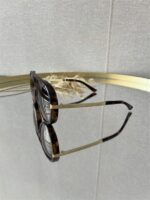 Zonnebril Golden Muse