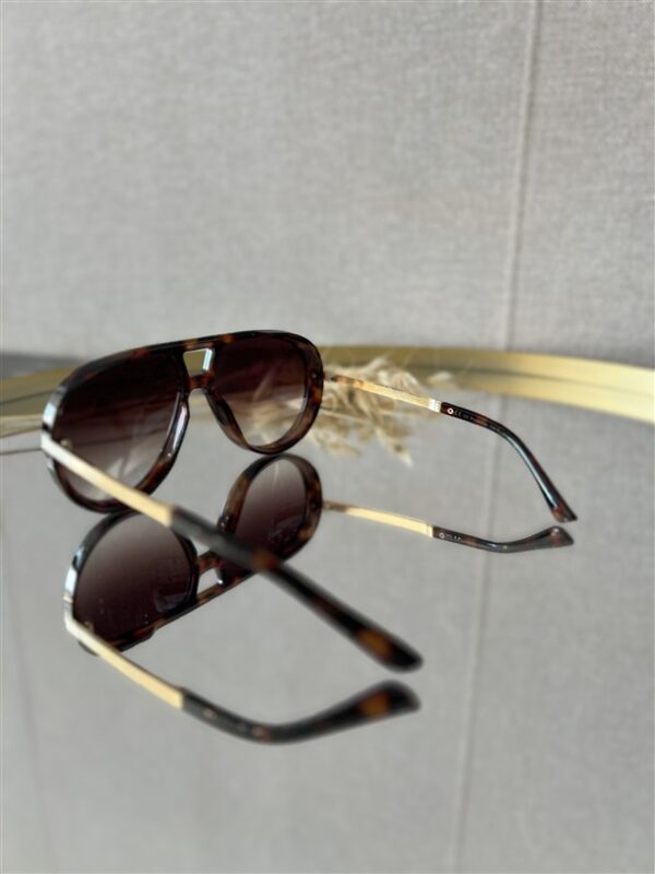 Zonnebril Golden Muse