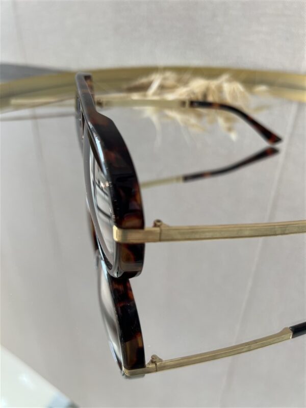 Zonnebril Golden Muse