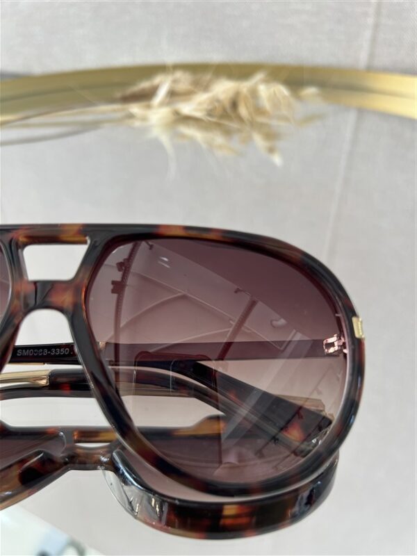 Zonnebril Golden Muse