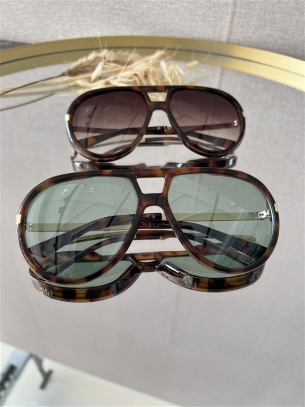 Zonnebril Golden Muse