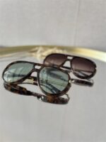 Zonnebril Golden Muse