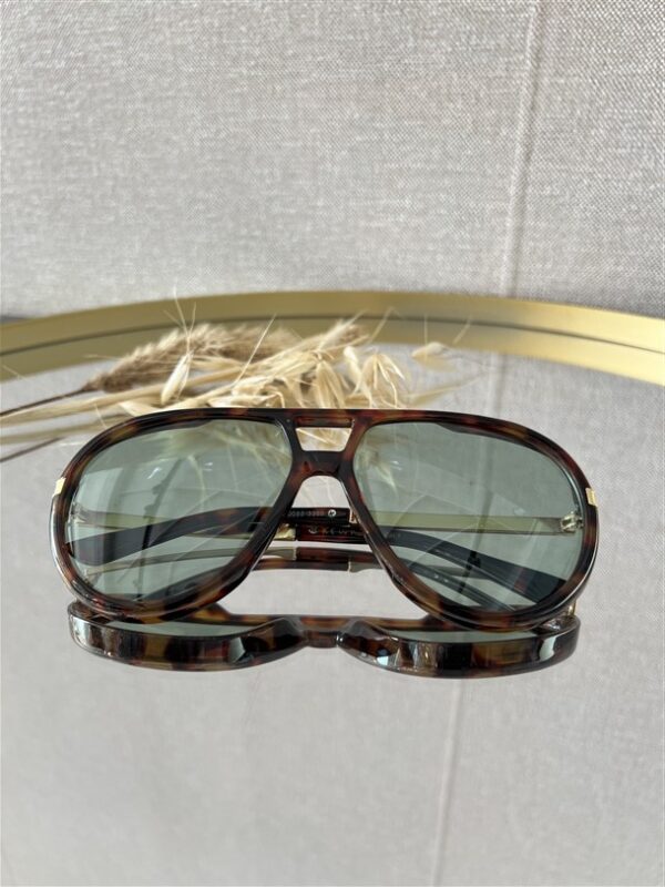 Zonnebril Golden Muse