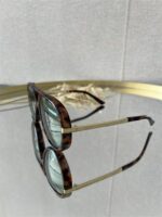 Zonnebril Golden Muse