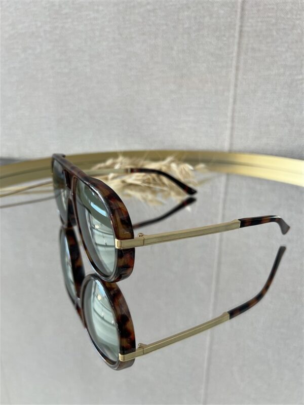 Zonnebril Golden Muse