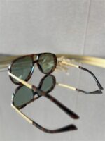 Zonnebril Golden Muse