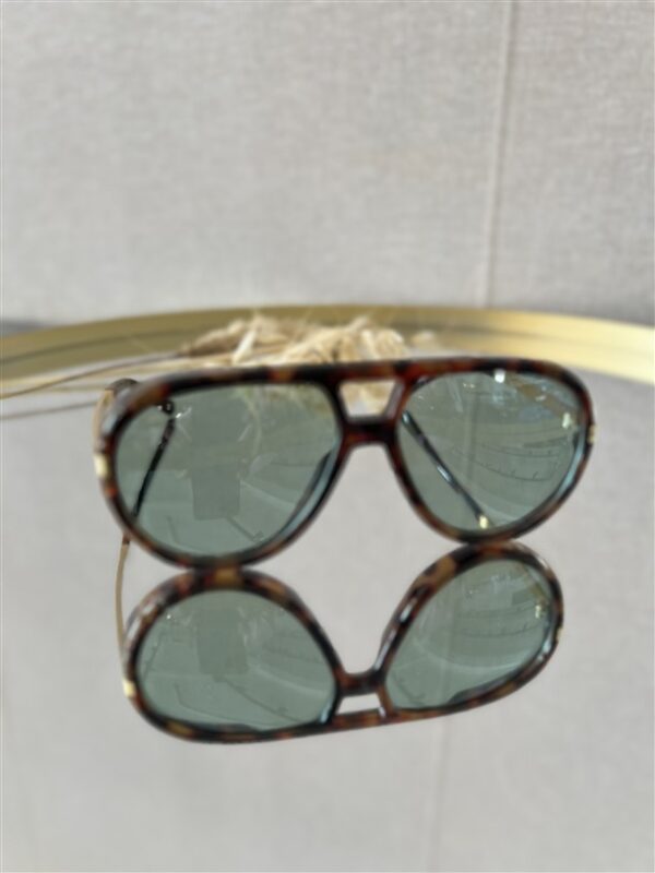 Zonnebril Golden Muse