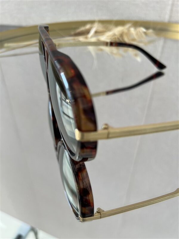 Zonnebril Golden Muse